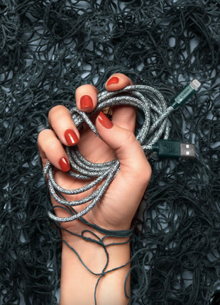Green iPhone Lightning cable · 2 meter · Made of recycled fishing nets